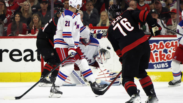 Brady Skjei #76 of the Carolina Hurricanes scores the game-winning goal against the New York Rangers during the third period in Game Four of the Second Round of the 2024 Stanley Cup Playoffs at PNC Arena on May 11, 2024 in Raleigh, North Carolina. 