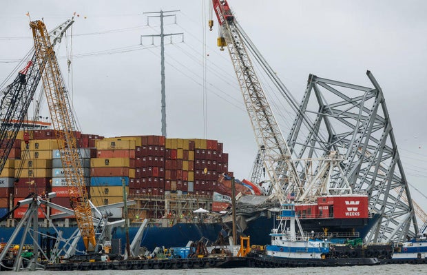 Crews continue working to reopen the shipping route at the site of the Francis Scott Key Bridge collapse in Baltimore