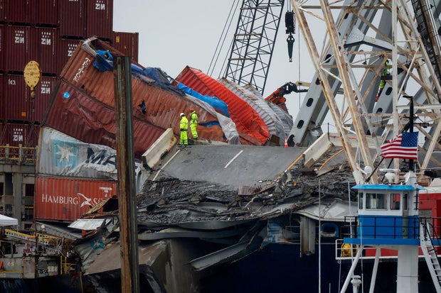 Crews continue working to reopen the shipping route at the site of the Francis Scott Key Bridge collapse in Baltimore