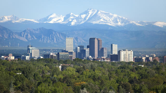Denver Colorado skyscrapers snowy Longs Peak Rocky Mountains summer 