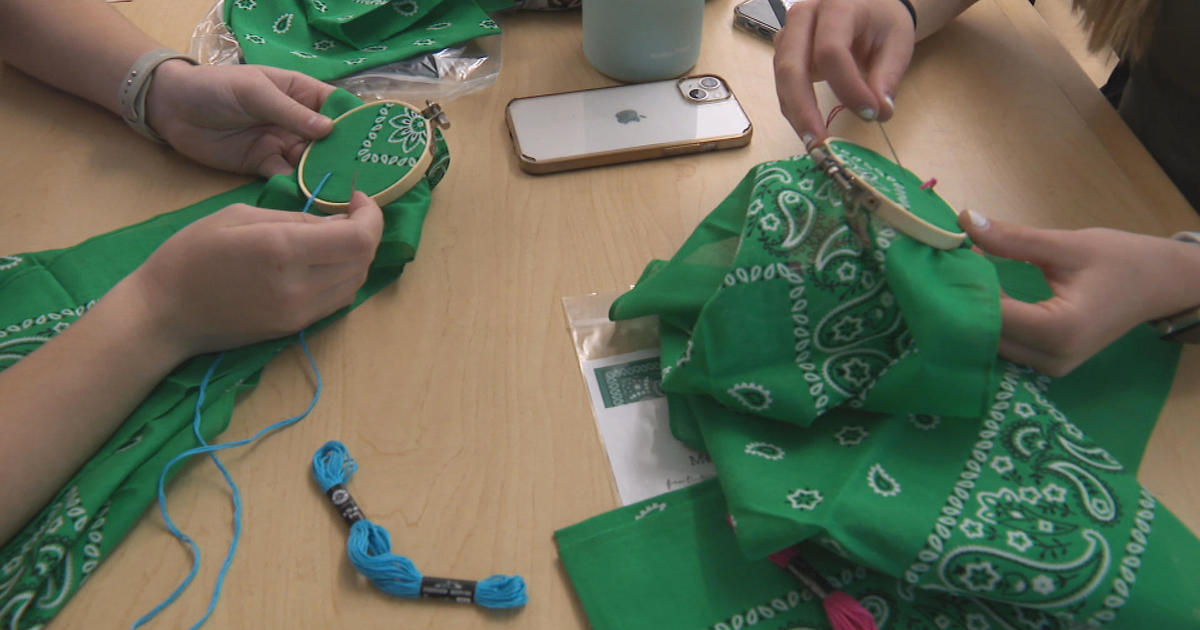 Massachusetts high school students promote mental health awareness with green bandanas