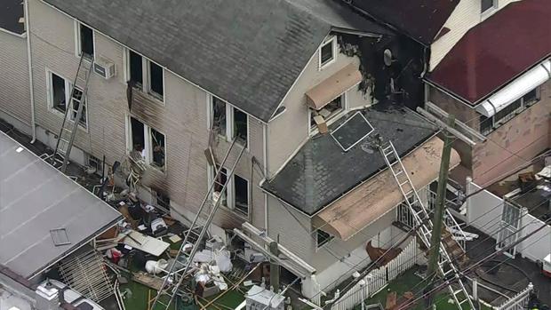 An aerial view of a home in the Bronx that appears to have significant fire damage. 