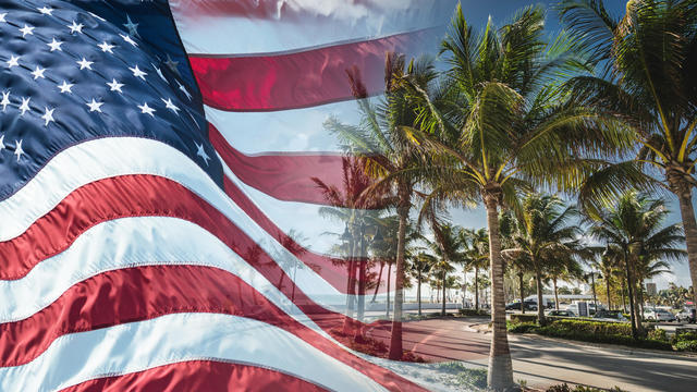 american flag waving for a national holiday in miami 