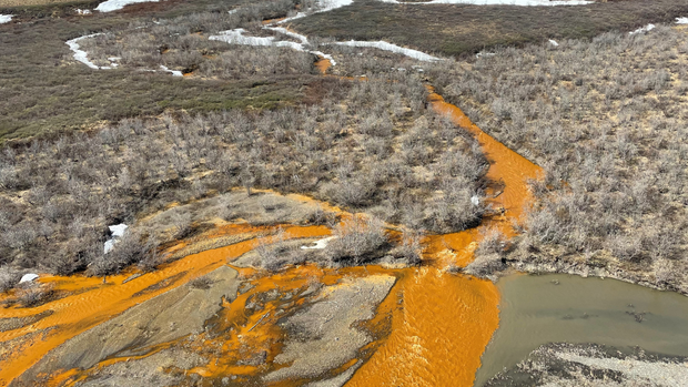 An orange tributary of the Kugororuk River
