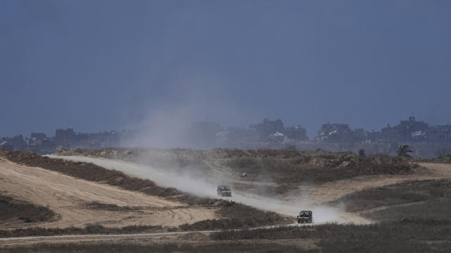An Israeli soldier sits behind a mounted gun near the southern border with the Gaza Strip on May 1, 2024, amid the ongoing conflict between Israel and the militant group Hamas. 