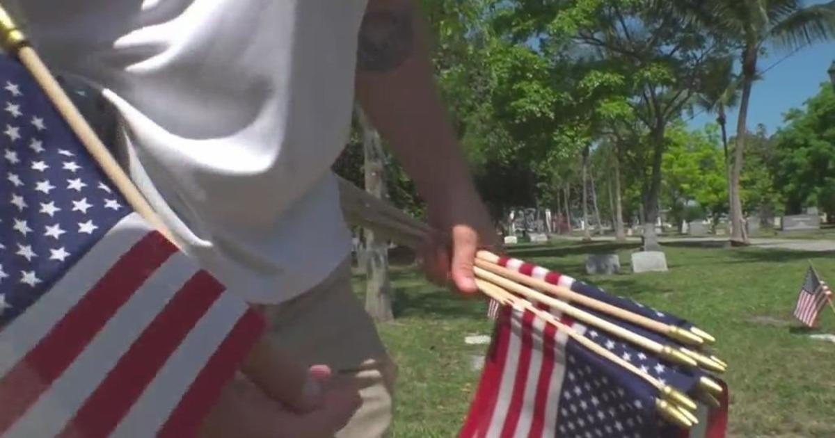Veteran plants flags in Miami City Cemetery with fallen veterans, aims to restore headstones