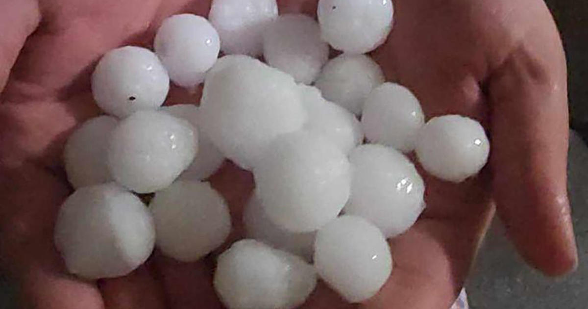 What causes hail, those frozen ice balls that fall during severe ...