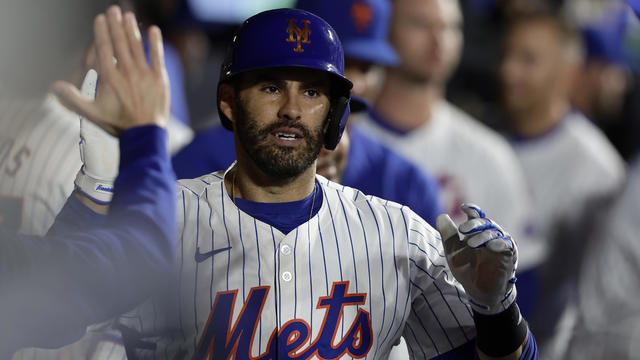 J.D. Martinez #28 of the New York Mets celebrates his eighth inning home run against the Arizona Diamondbacks with his teammates in the dugout at Citi Field on May 30, 2024 in New York City. 