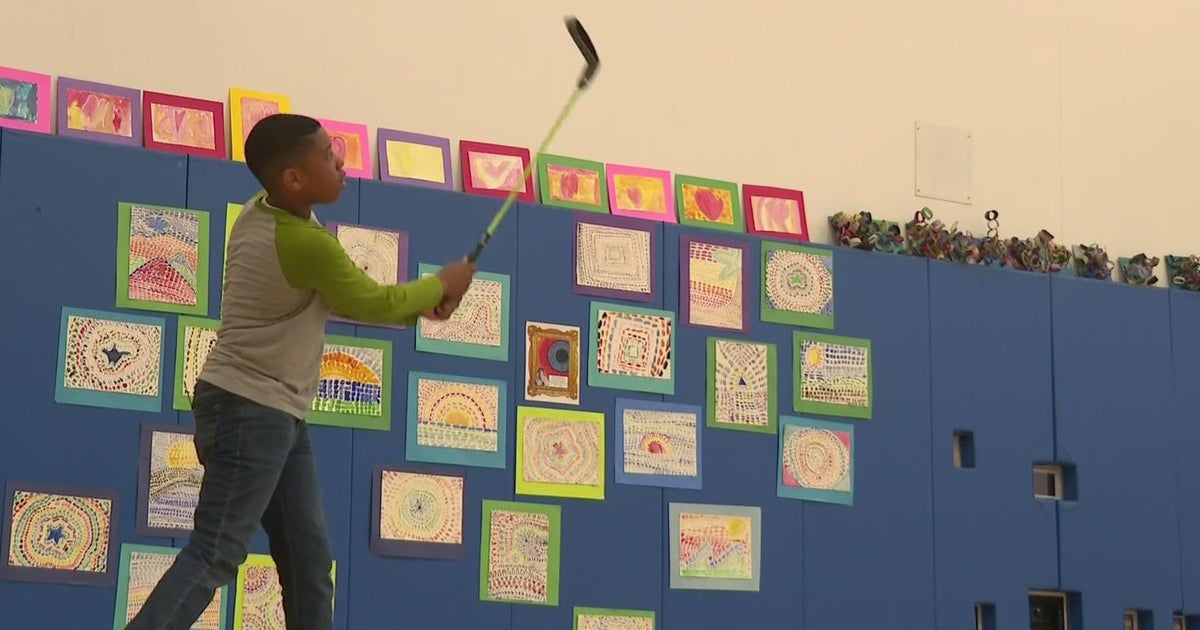 Chicago students swing high learning life skills through golf - CBS Chicago