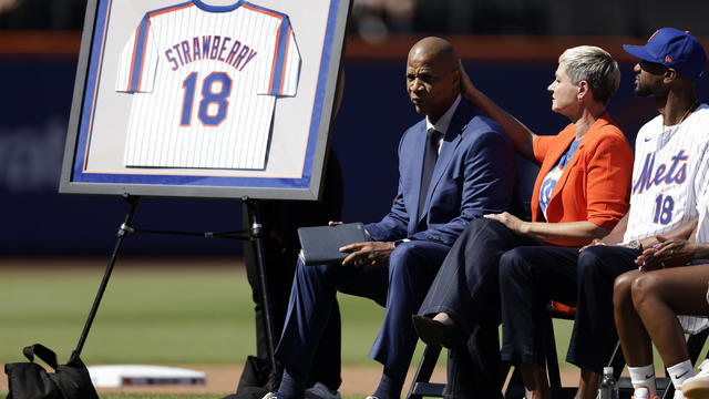 Darryl Strawberry, New York Mets legend, reacts with his wife Tracy during his jersey number retirement ceremony before a game against the Arizona Diamondbacks at Citi Field on June 1, 2024 in New York City. 
