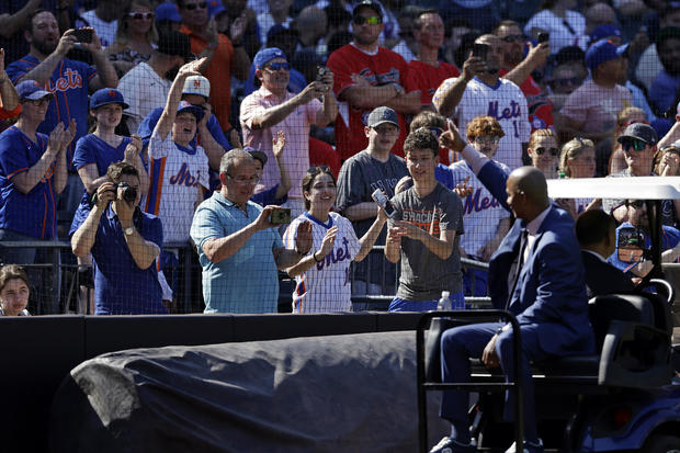 Darryl Strawberry, New York Mets legend, reacts with fans after his jersey number retirement ceremony before a game against the Arizona Diamondbacks at Citi Field on June 1, 2024 in New York City. 