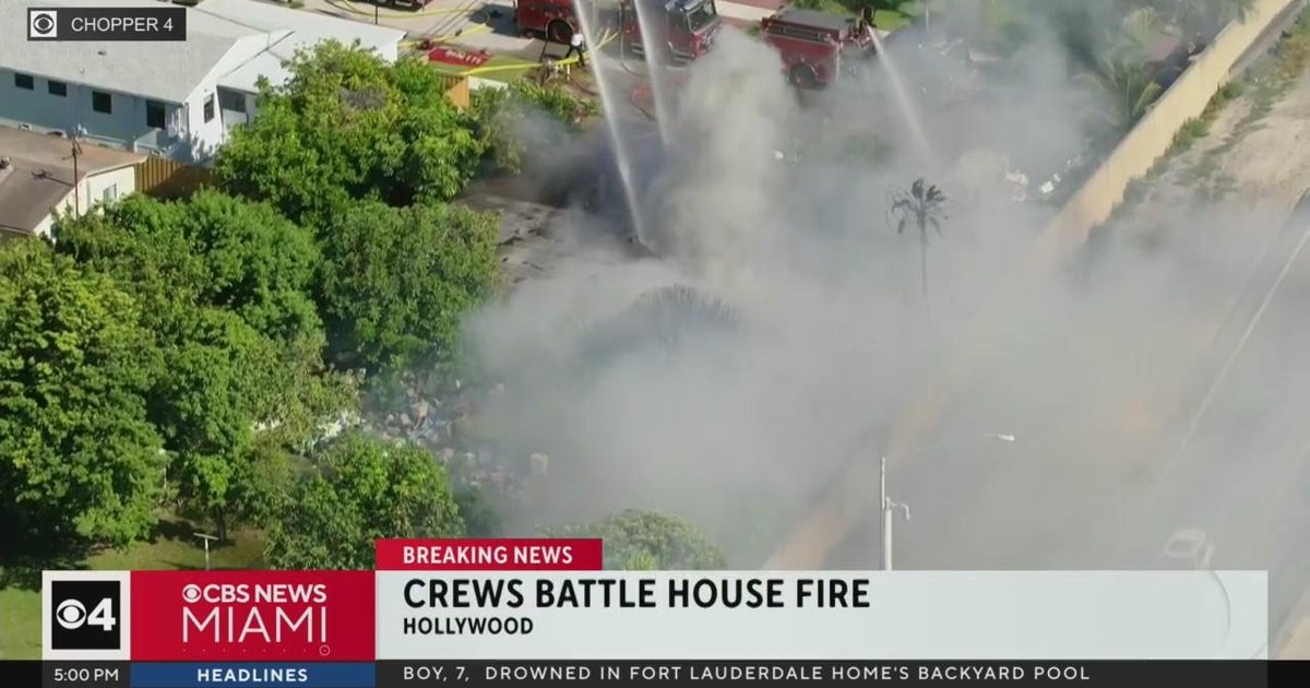 Crews battle house fire in Hollywood - CBS Miami