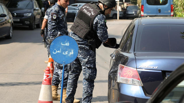 Lebanese police man a checkpoint near the U.S. embassy in Awkar 