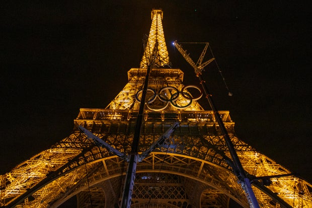 Olympic symbols revealed at the Eiffel Tower