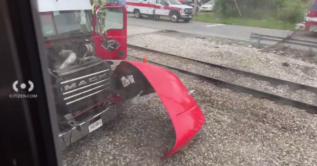 South Shore trains halted after train collides with dump truck - CBS ...
