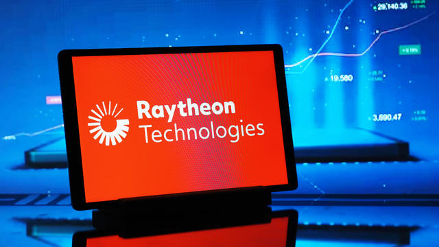 In this photo illustration, a Raytheon Technologies (RTX 