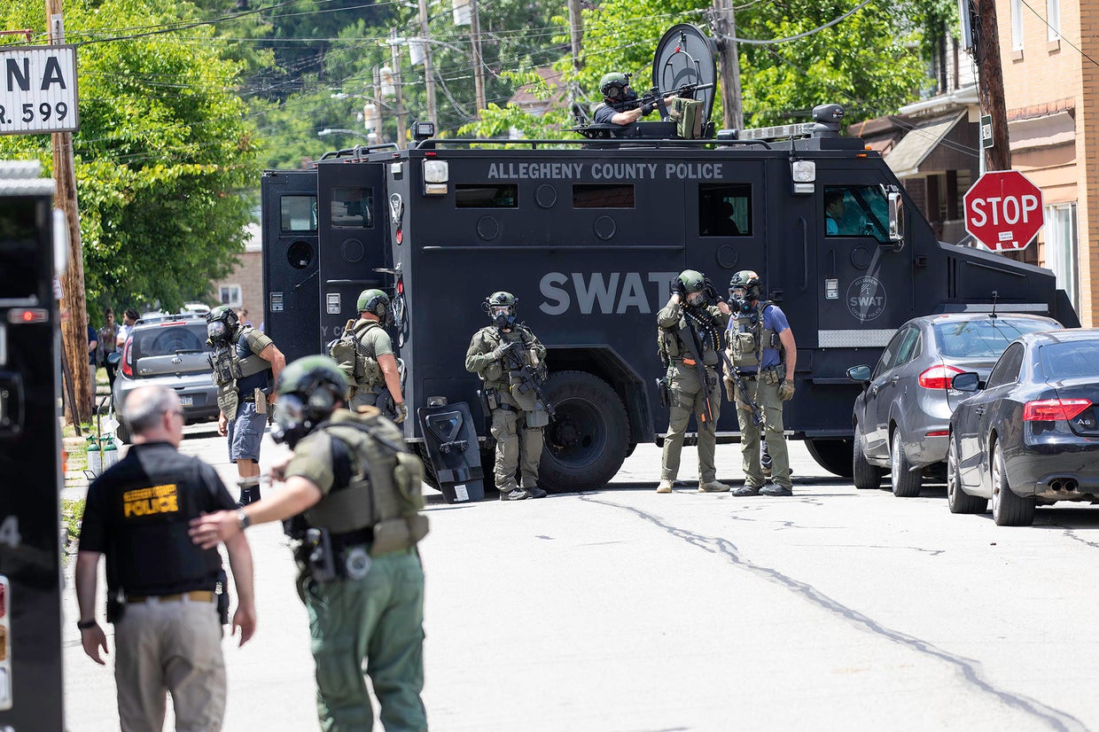 Man taken into custody by SWAT officers after hours-long standoff in ...