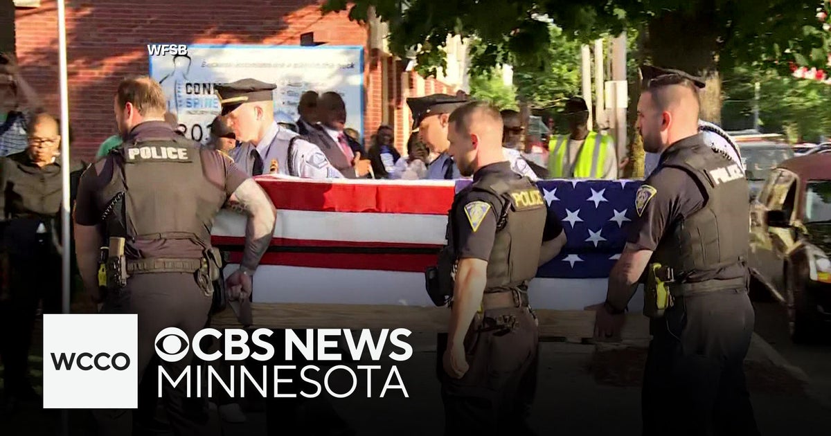 Minneapolis police officer killed in line of duty returns home to ...