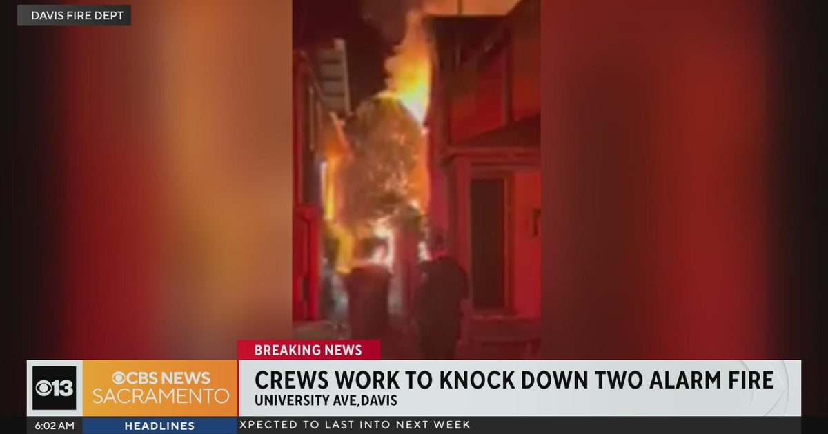 Firefighters battle 2-alarm house fire in Davis