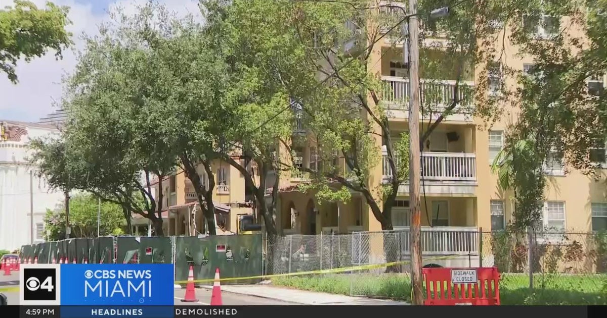 Demolition begins at site of massive Miami apartment complex fire - CBS ...