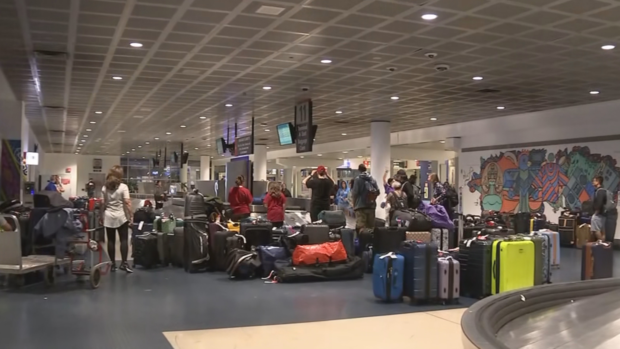 Piles of baggage at Philadelphia International Airport Monday morning 