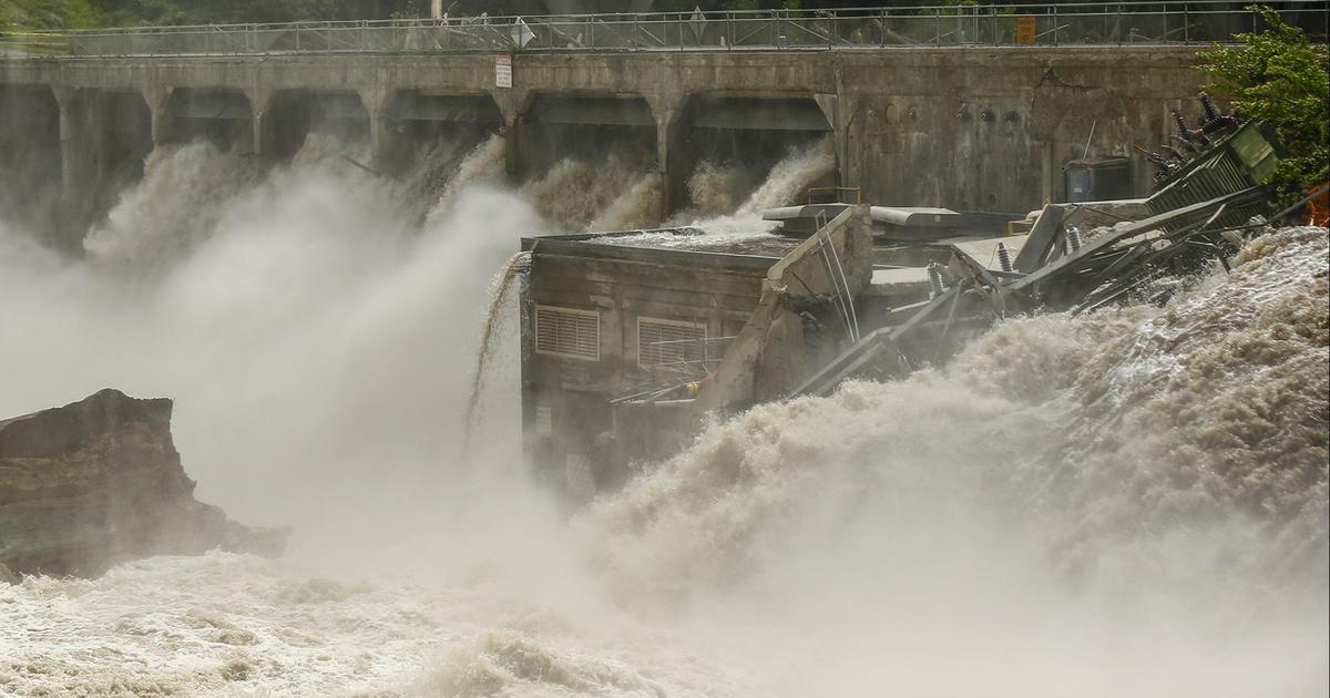 Minnesota dam partially fails after extreme flooding