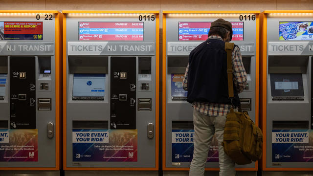 A commuter at a ticket kiosk at New Jersey Transit train station at Penn Station in New York, US, on Tuesday, June 18, 2024. 