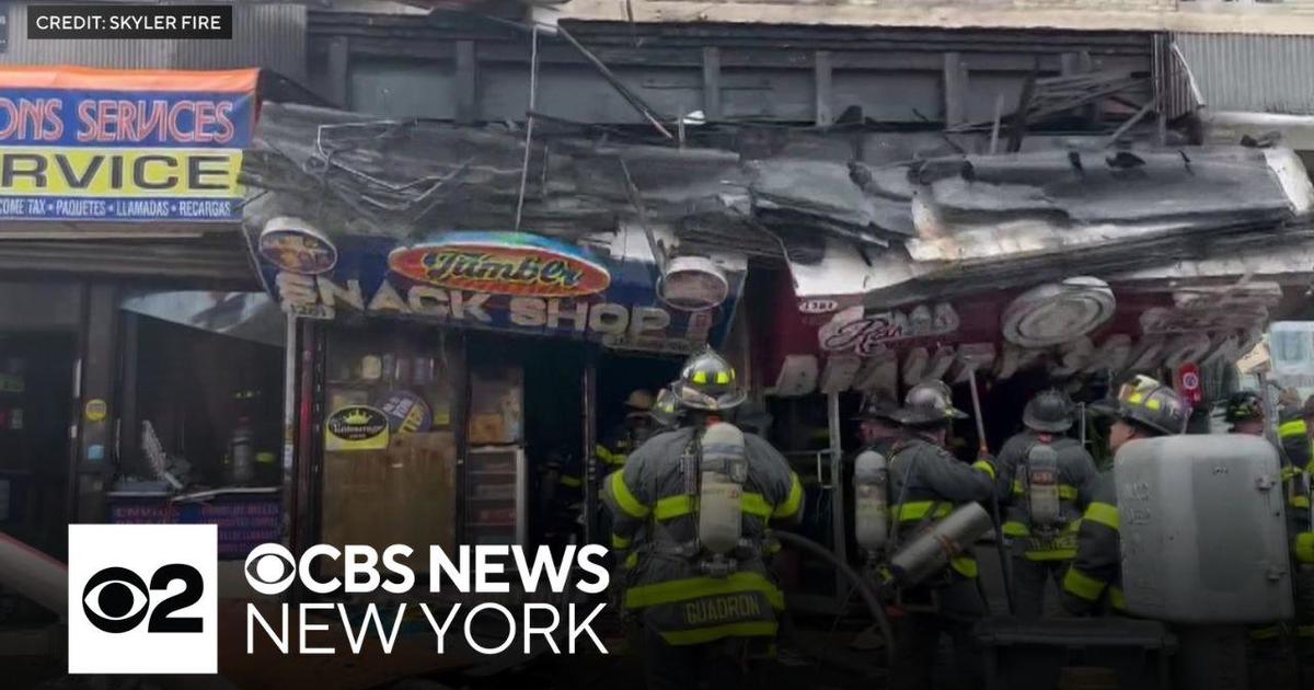 Video shows store signs collapsing on firefighters in Washington Heights