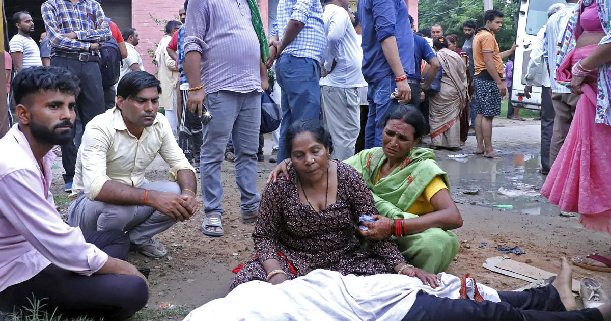 Stampede at religious gathering in India leaves at least 77 dead