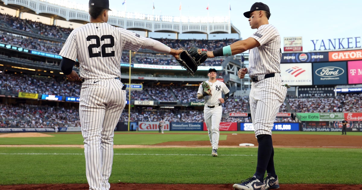 Reds Defeat Yankees 3-2 with Abbott, Cruz