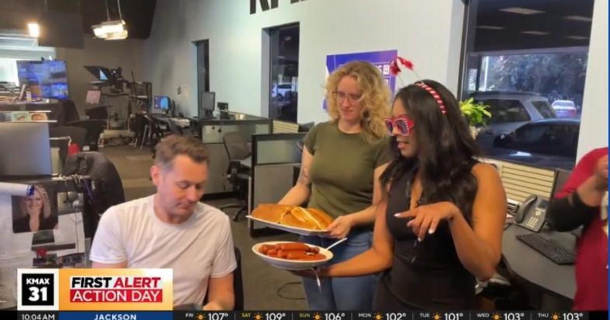 Watch as Ashley tries to get the newsroom o eat 58 hotdogs!