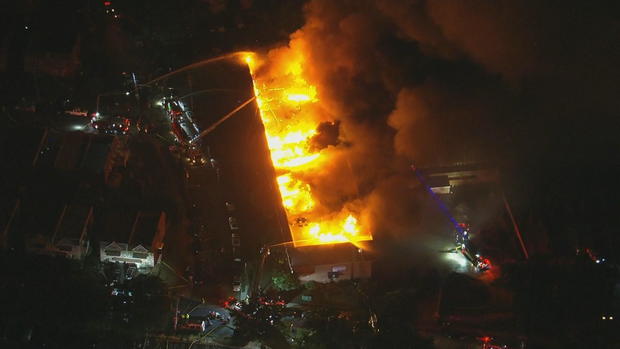 A massive fire burns in an apartment building 