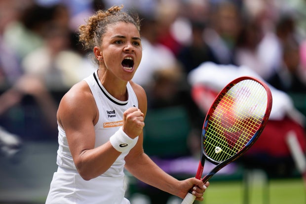 Jasmine Paolini of Italy reacts after winning a point against Barbora Krejcikova of the Czech Republic during the women's singles final at the Wimbledon tennis championships in London