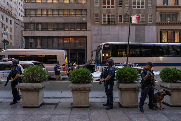 Law enforcement stand guard outside of Trump Tower in New York City, after Former President Donald Trump was injured when shots were fired at a rally in Pennsylvania on July 13, 2024. 