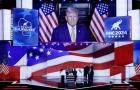Donald Trump is seen on the stage screen as preparations are underway for the second day of the Republican National Convention at the Fiserv Forum on July 16, 2024, in Milwaukee, Wisconsin. 