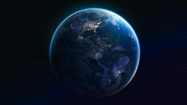 Earth planet at night into the dark. Cities light. Earth in deep space with stars. Planet sphere. Elements of this image furnished by NASA 