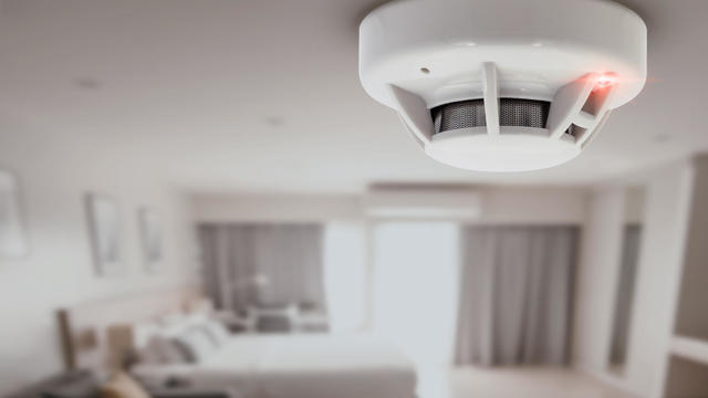smoke detector fire alarm detector home safety device setup at home hotel room ceiling 