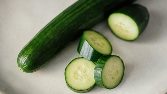 Close up of slices of cucumber on a plate. 