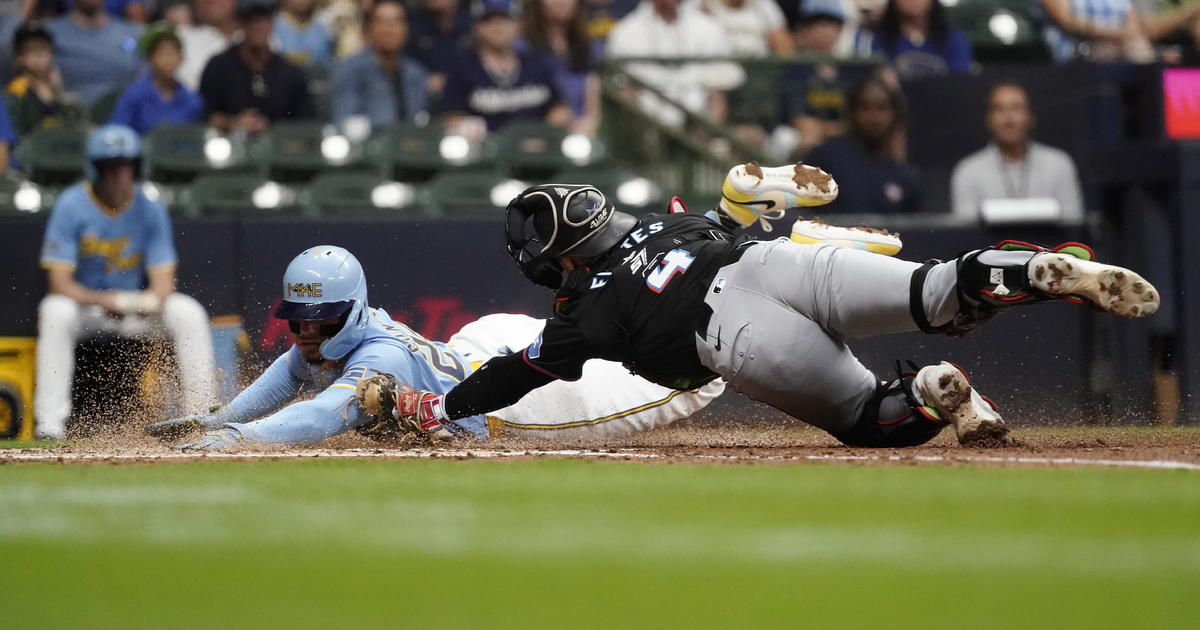 Marlins strike early in 6-2 victory over Brewers