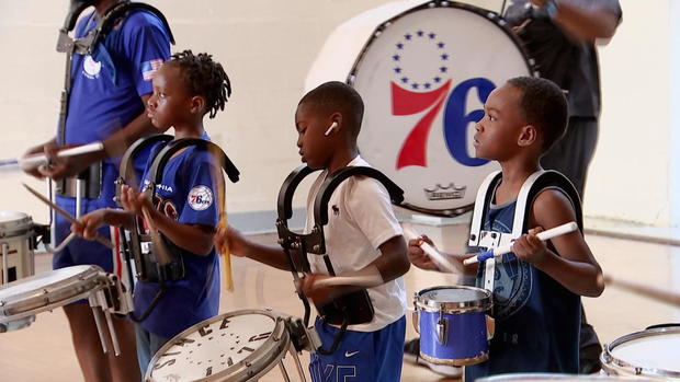 Kids practicing with the Sixers Stixers drumline 