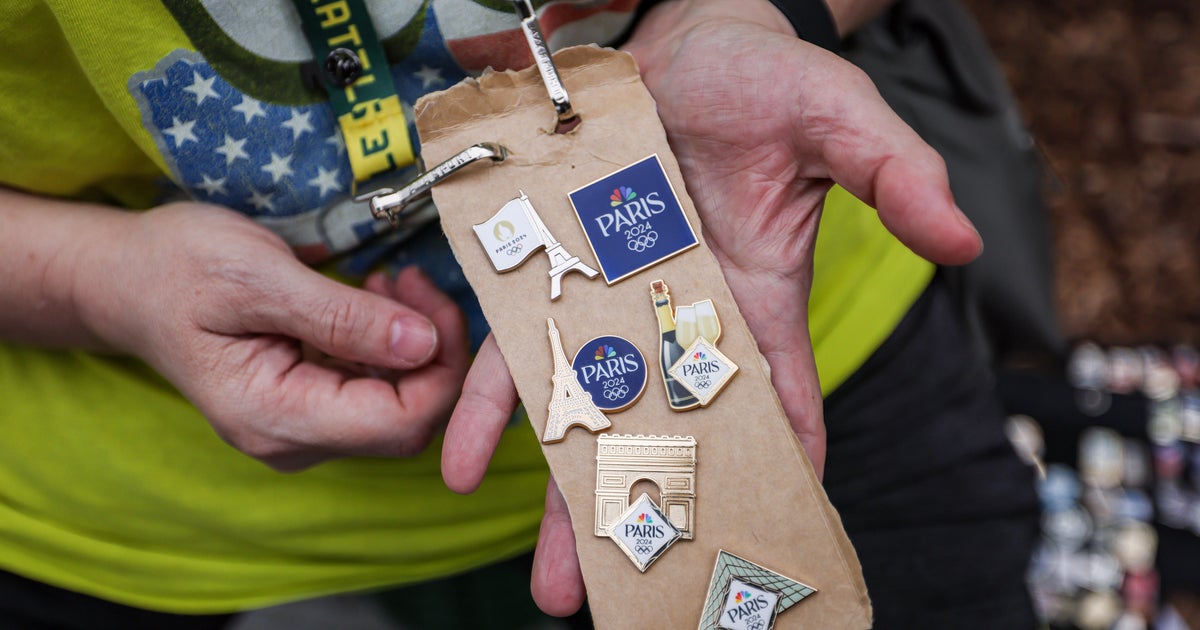 Olympic pin trading fever sweeps the 2025 Paris Games CBS News