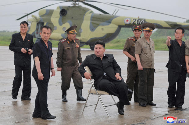 North Korean leader Kim Jong Un observes rescue efforts in flooded areas near the country's border with China, in North Pyongan Province 