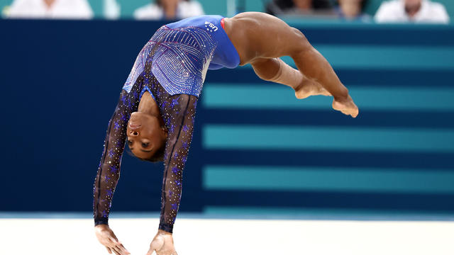 Simone Biles waves to fans at theU.S. Olympic Team Trials 