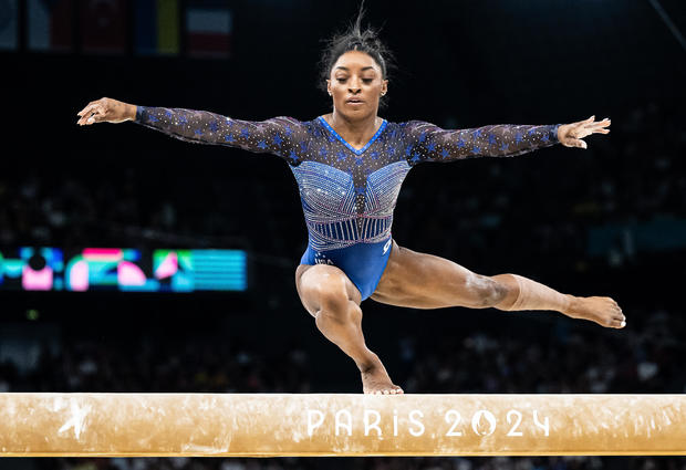 imone Biles of Team USA performs on balance beam 