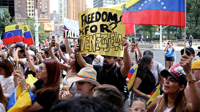 Demonstrators protest against Venezuelan President Nicolas Maduro's questioned presidential victory, in front of UN headquarters in New York, August 2, 2024. 