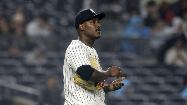 Enyel De Los Santos #62 of the New York Yankees reacts after allowing a three run double to Jo Adell #7 of the Los Angeles Angels (not pictured) in the top of the fifth inning at Yankee Stadium on August 8, 2024 in New York City. 