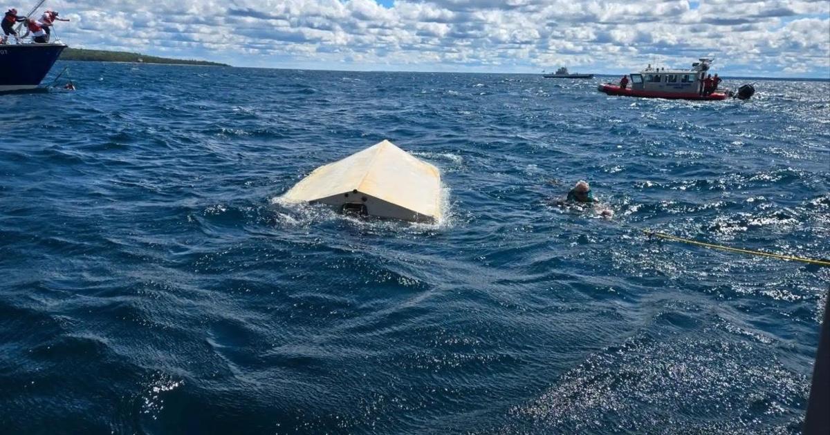 Coast Guard rescues 5 people and a dog after boat capsized near Mackinac Island