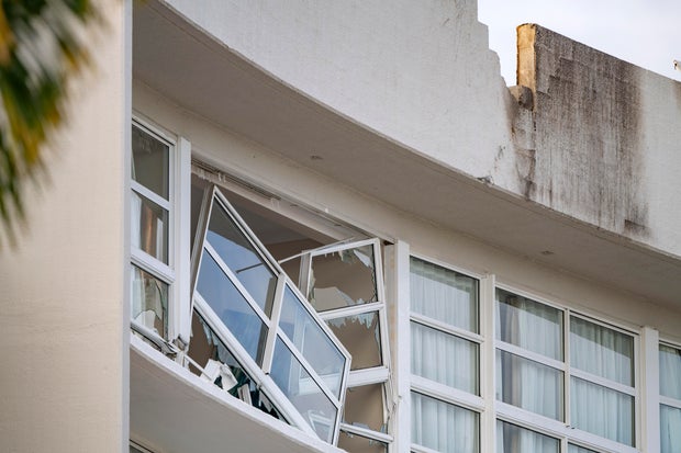 Pilot dies after helicopter crashes into Australian hotel