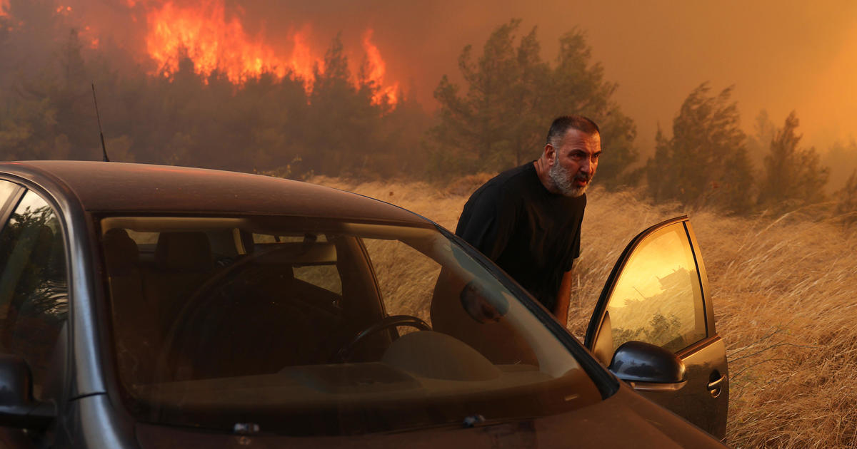 Thousands evacuated near Greek capital Athens as major wildfire rages out of control