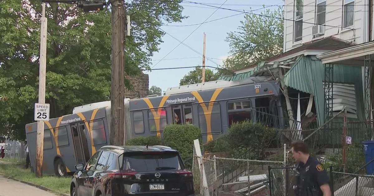 Bus Crashes into Home During Police Chase